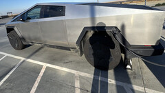 Cybertruck topping up at a Supercharger (image: Tyler Yust/X)